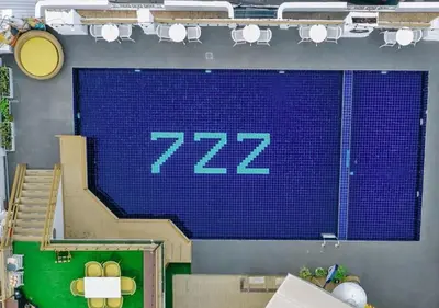 a large blue screen with the number on it at \u66fc\u8c37\u4e1c\u65b9\u9152\u5e97 in Bangkok