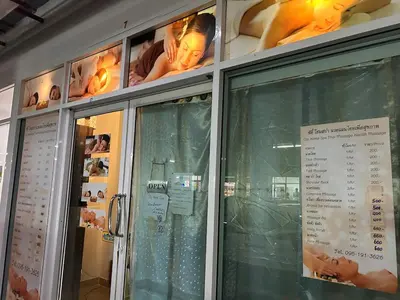 a restaurant with a window with a menu in it at Charming condo 5min walk to MRT near DMK,Chatuchak in Bangkok