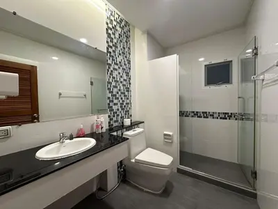 a bathroom with a sink and a toilet and a shower at 906 Bangkok City Center Single Pool Villa BTS Asok 5 Bedrooms 6 Bathrooms in Bangkok
