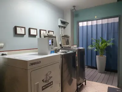 an office with a desk with a computer on it at The Studio at Sathorn Terrace in Bangkok