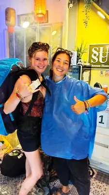 a man and a woman posing for a picture at SU SU khaosan hostels in Bangkok