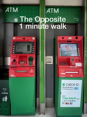 two atm machines sitting in front of a store at Belivin'98 Sense of Pier Sathorn Residence in Bangkok