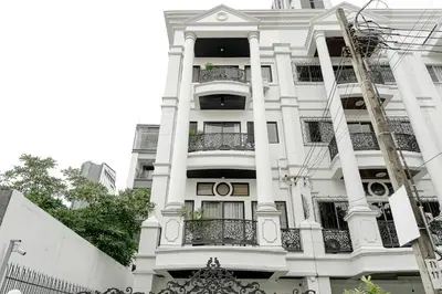 a white building with a balcony on it at Asok house Sukhumvit27 Free BF in Bangkok