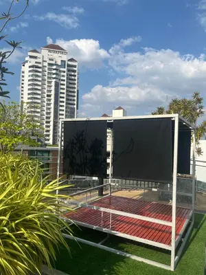 a large screen on the roof of a building at Stylish Apartment in Sukhumvit in Bangkok