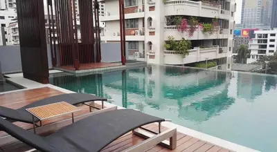 a swimming pool on the roof of a building at 4Pax MRT BTS Asoke, Terminal21 in Bangkok