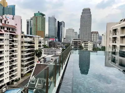 a swimming pool in the middle of a city at 4Pax MRT BTS Asoke, Terminal21 in Bangkok