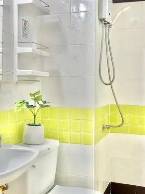 a bathroom with a sink and a shower at KANYA Popular Condo in Ban Bang Phang