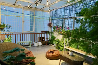 a greenhouse with a bunch of plants in it at Les Fleurs Bangkok Hostel in Bangkok