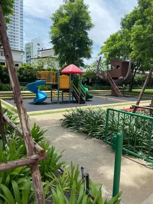 a park with a playground with a slide at Room near Iconsiam 2km in Bangkok