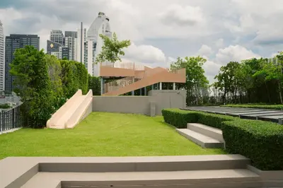 a building with a skateboard ramp in a park at 5 star Luxurious 1BD apt King Bed Thong Lor in Bangkok