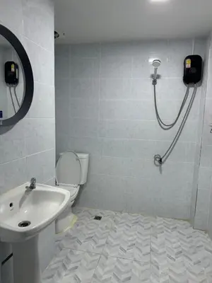 a bathroom with a sink and a toilet and a shower at GM6 - Samyan 4floors, 4mins walk to Bantadtong in Bangkok