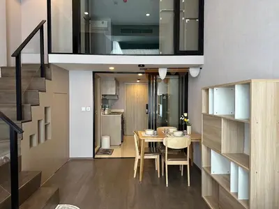 a kitchen and dining room with a table and chairs at Standardized at City View Condo near BTS Ratchathewi in Bangkok