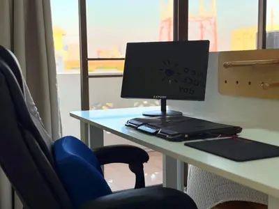 a desk with a computer on a table with a chair at 55sqm Hispeed LAN WiFi workplace 24h maxvalu in Bangkok