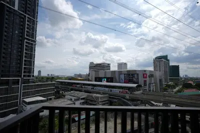 a view from a balcony of a city with a train at Life Ladprao 2 bedrooms condo in Bangkok