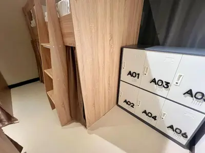 a group of wooden cabinets with numbers on them at smoking buddy house in Bangkok