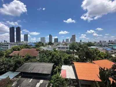 a view of a city with buildings and roofs at Chill Condo near Icon Siam in Bangkok