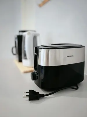 a toaster oven with a cord plugged into it at 5 beds private garden resort 452sqm Pet relax in Sathani Ban Hua Mak