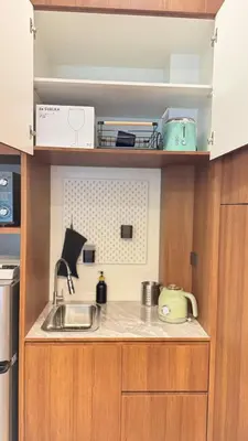 a kitchen with a sink and a counter top at Nueng Rana 113 Unique House in Chinatown 3BR 2BA - Villa in Samphanthawong