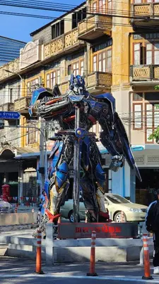 a statue of a man on a motorcycle on a street at Best River view, Retro vibe studio apartment - Bangkok Old Town in Bangkok
