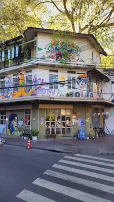 a building with graffiti on the side of it at Best River view, Retro vibe studio apartment - Bangkok Old Town in Bangkok