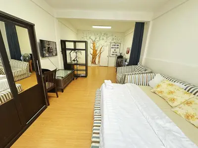 a living room with a bed and a couch at Top Location! 800m MRT Rama9 in Bangkok