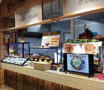 a food counter in a restaurant with food on display at ห้องเช่ารายวัน เมืองทองธานี C5 By ณดา in Ban Bang Phang