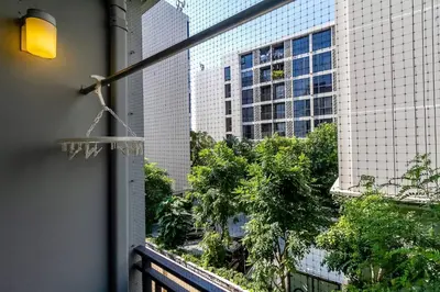 a view of a city from a balcony at TC Contel At BTS Onnut Century in Amphoe Phra Khanong
