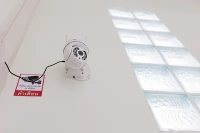 a small white appliance with a sign on it at 94Home Donmuang in Bang Khen