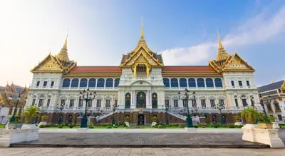 a large building with gold spires on top of it at Oh Boutique Guesthouse. in Bangkok