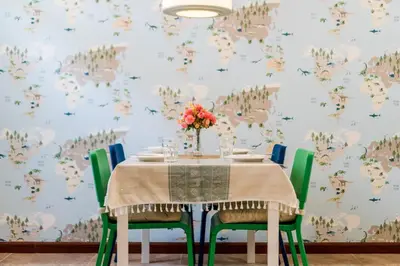 a table with a vase of flowers on it at Coco59- Private 3BR Pool Villa in Bangkok