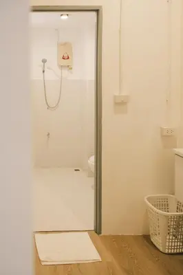 a bathroom with a shower with a glass door at City Silom I King Bed I Sleep 3 I 2 Bedroom in Bangkok