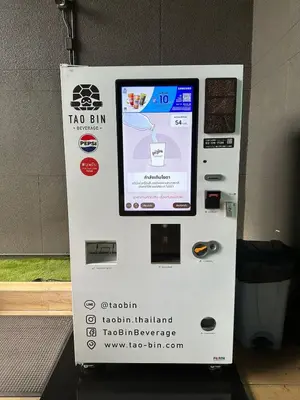 a vending machine with a sign on the side of it at Condo, 3-min walk to BTS, Sky pool, Gym, Wifi, Self check-in at pickup point in Bangkok