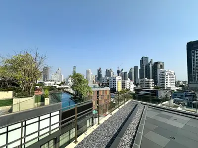 a view of a city from the roof of a building at Stylish Downtown 1BR - Ultra Fast WiFi - BTS ThongLor in Bangkok