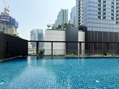 a large swimming pool on top of a building at Exclusive Cityscape - Ultra Fast WiFi - BTS Thong Lor in Bangkok