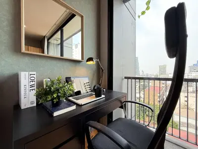 an office with a desk with a computer and a window at Contemporary Stylish 1BR - Ultra Fast Wifi - Silom in Bangkok