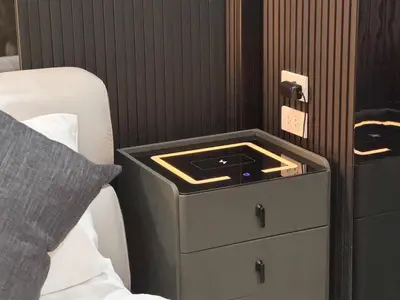 a bedroom with a night stand next to a bed at Delta9 Phrakanong 3 mins BTS Phrakanong in Bangkok