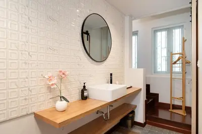 a bathroom with a sink and a mirror at 2BR 1BA Home In Yaowarat 5 Min MRT Nivas Wanit ECO in Bangkok