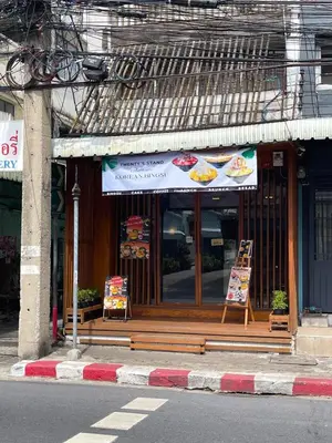 a store with two signs in the front of a building at Rare Bangkok Townhouse Perfect for Groups, 8 mins to Train in Bangkok