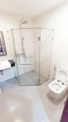 a bathroom with a shower and a toilet at XX Yon INN Sukhumvit 4- BTS Nana in Bangkok