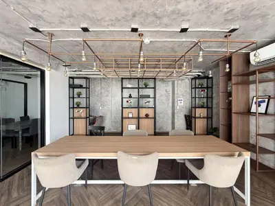 a conference room with a wooden table and chairs at Serene Tropical 1BR - Ultra Fast Wifi - Sathorn in Bangkok