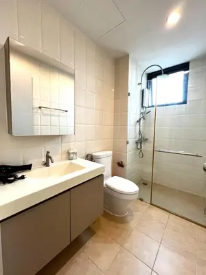 a bathroom with a toilet and a sink and a shower at 2Bedroom 50meters to BTS Onnut in Bangkok