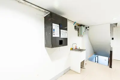 a room with a sink and a counter at XX Oh My Nap BTS Nana - โอ้ มาย แน็ป บีทีเอส นานา in Bangkok