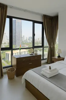 a bedroom with a large bed and large windows at 2BR 2BA Luxury Lifestyle 5min walk Thonglor BTS in Bangkok