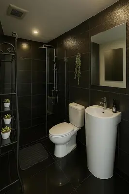 a bathroom with a toilet and a sink and a shower at 2BR 2BA Luxury Lifestyle 5min walk Thonglor BTS in Bangkok