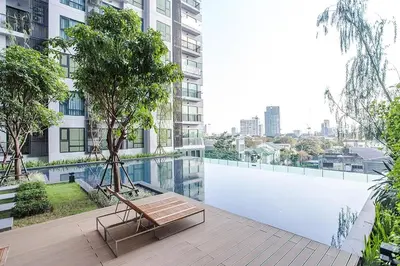 a bench on a balcony of a building at 2BR 2BA Luxury Lifestyle 5min walk Thonglor BTS in Bangkok