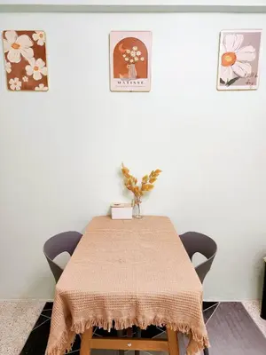 a dining room table with a table cloth on it at 808-STP Homely room Free Wi-Fi and Near BTS in Sathani Bang Khen