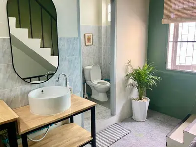 a bathroom with a sink and a toilet at 326 Podtel at The Breakie Bar in Bangkok