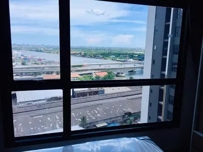 a view of a river from a window at Great facilities n River view n Local in Ban Sai Ma