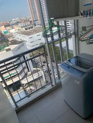 a balcony with a trash can and a view of a city at Supalai Wellington 2, near MRT in Sathani Khlong Tan