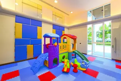 a childs room with a play room with a play set at Supalai Wellington 2, near MRT in Sathani Khlong Tan
